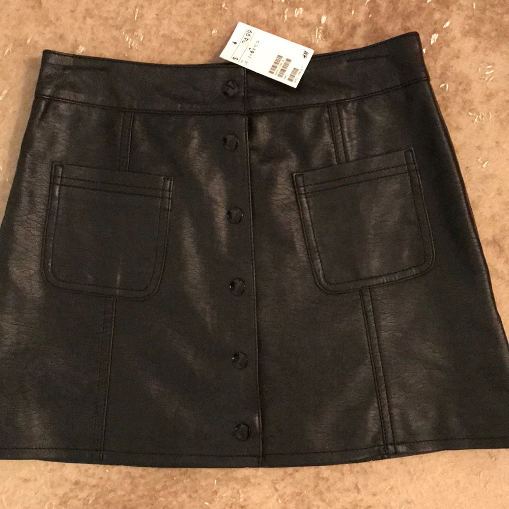 Button up leather mini skirt